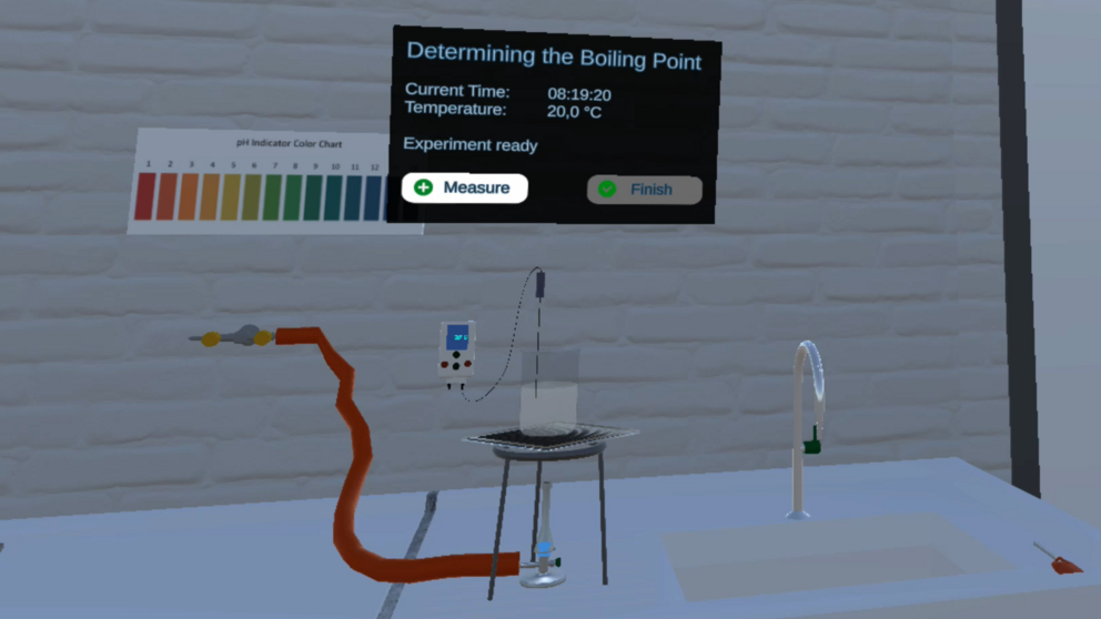 A beaker filled with water stands upon a gas burner in the VirtuChemLab. Above it is a window showing the current time and temperature.